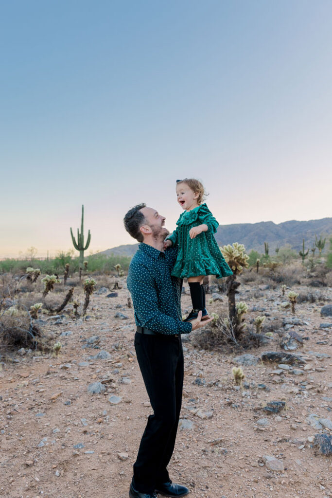 family photographer with client in White Tank Mountain Regional Park on a sunny day.