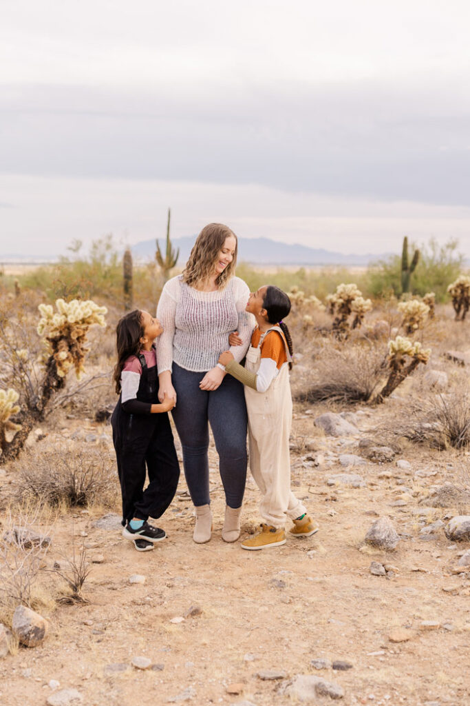portrait of mother and daughters at White Tank Mountain Regional Park, AZ.