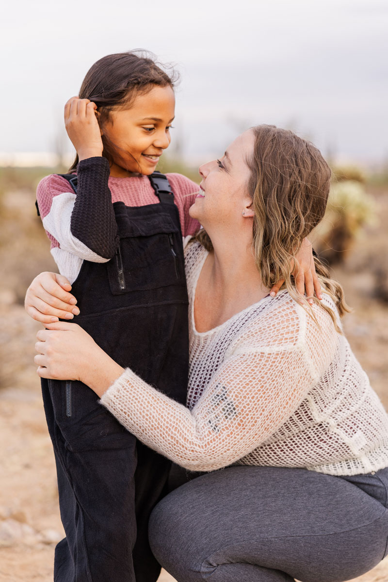 portrait photo of mom and daughter bonding in Surprise Arizona.