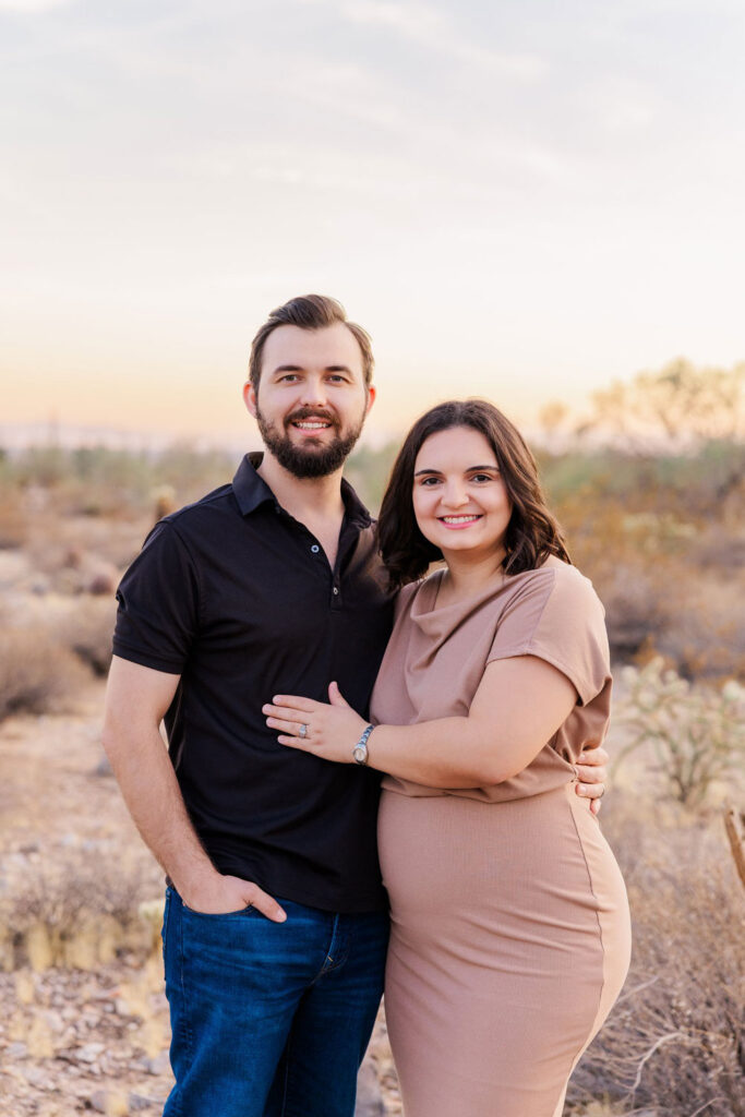 portrait photographer with client in Surprise AZ at golden hour.