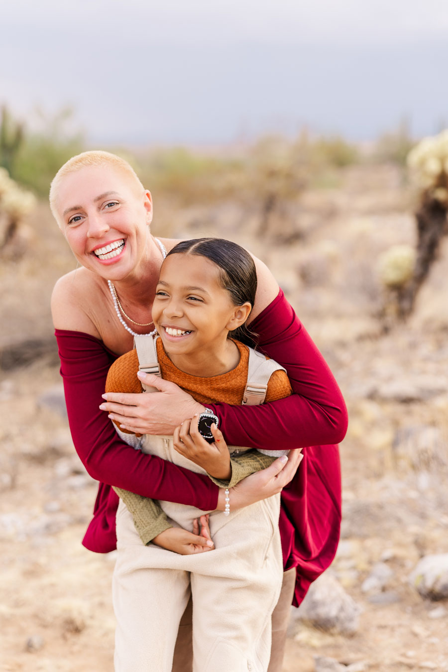 mother hugging daughter family portrait in Surprise Arizona.